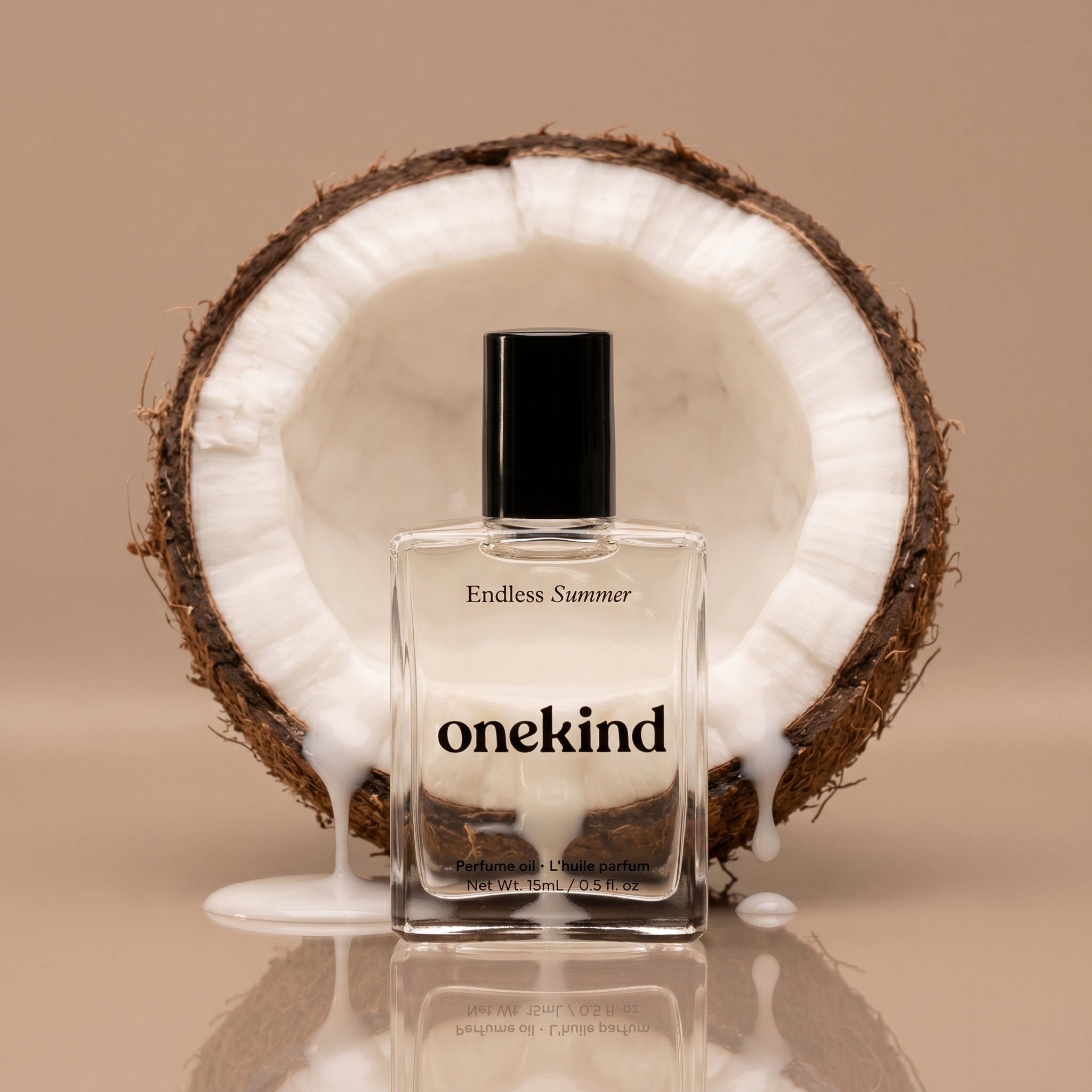 onekind perfume bottle with a coconut on a beige background