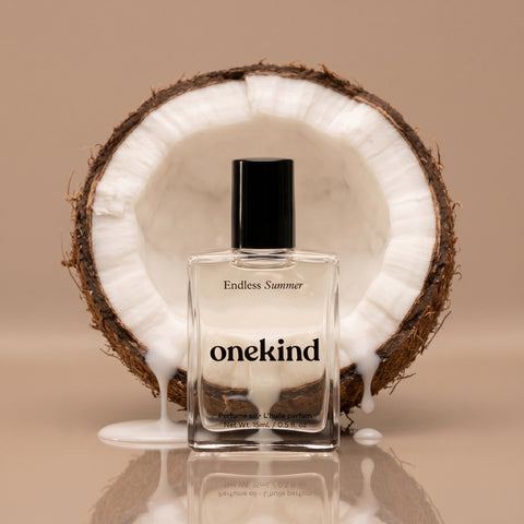 onekind perfume bottle with a coconut on a beige background
